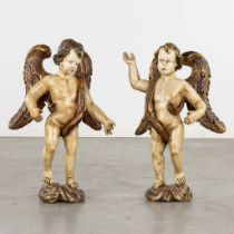 A pair of decorative and wood-sculptured angels, polychrome. 18th/19th C. (L:27 x W:48 x H:78 cm)