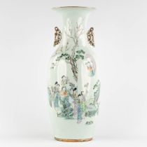 A Chinese vase decorated with ladies in the garden. (H:59 x D:22 cm)