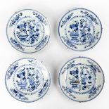 Four Chinese Chargers or Plates, blue white decorated with fauna and flora. (D:23,5 cm)