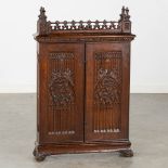 An antique wall-mounted cabinet, wood-sculptures in Gothic Revival style. 19th C. (L:14 x W:54 x H:8