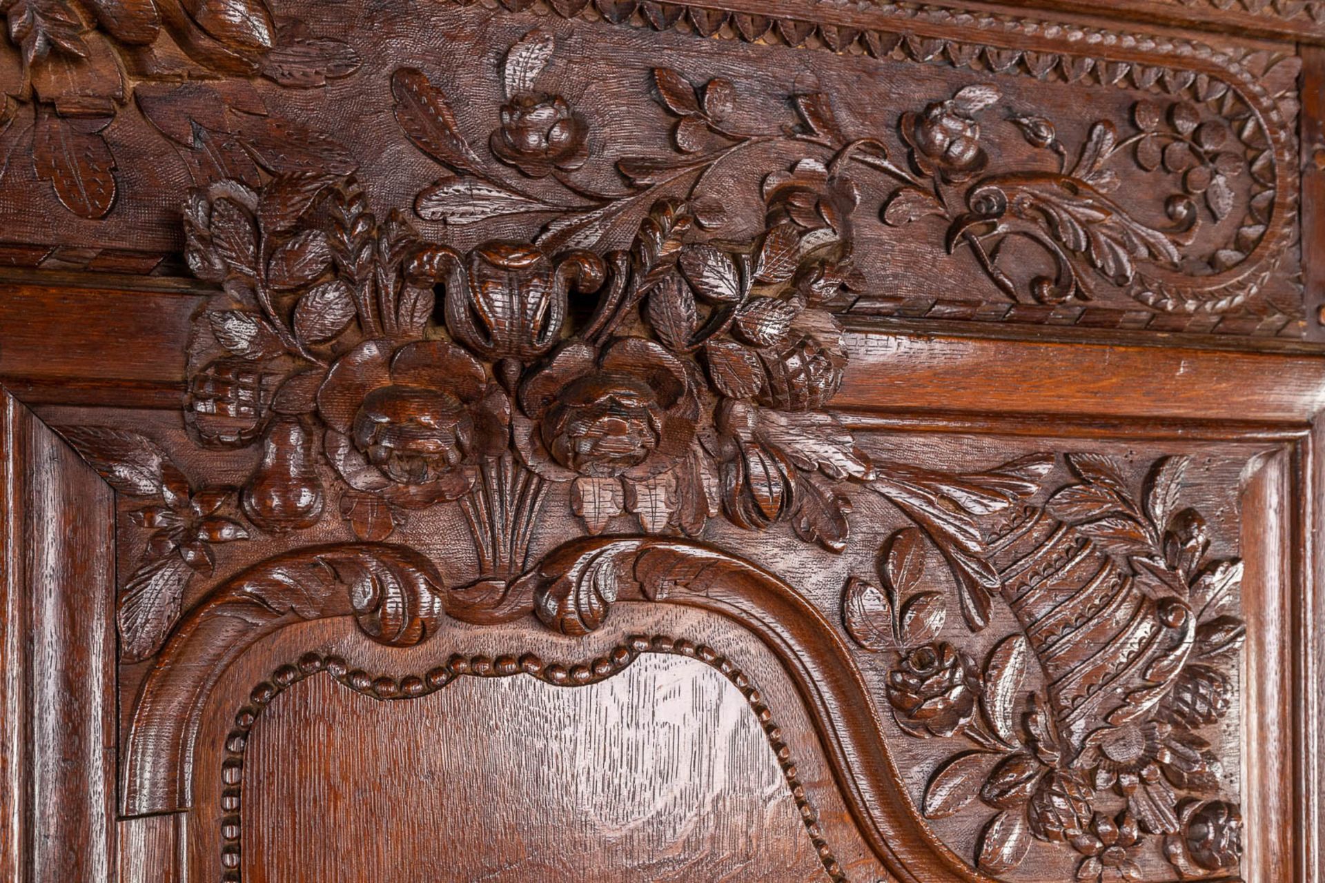 A richly sculptured and antique Normandy high cabinet, Armoire. France, 18th C. (L:68 x W:175 x H:23 - Bild 13 aus 21