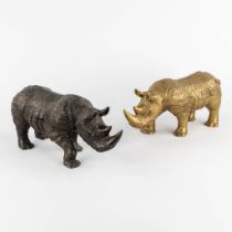 A pair of Rinoceros figurines, gilt and patinated bronze. (L:13 x W:37 x H:18 cm)