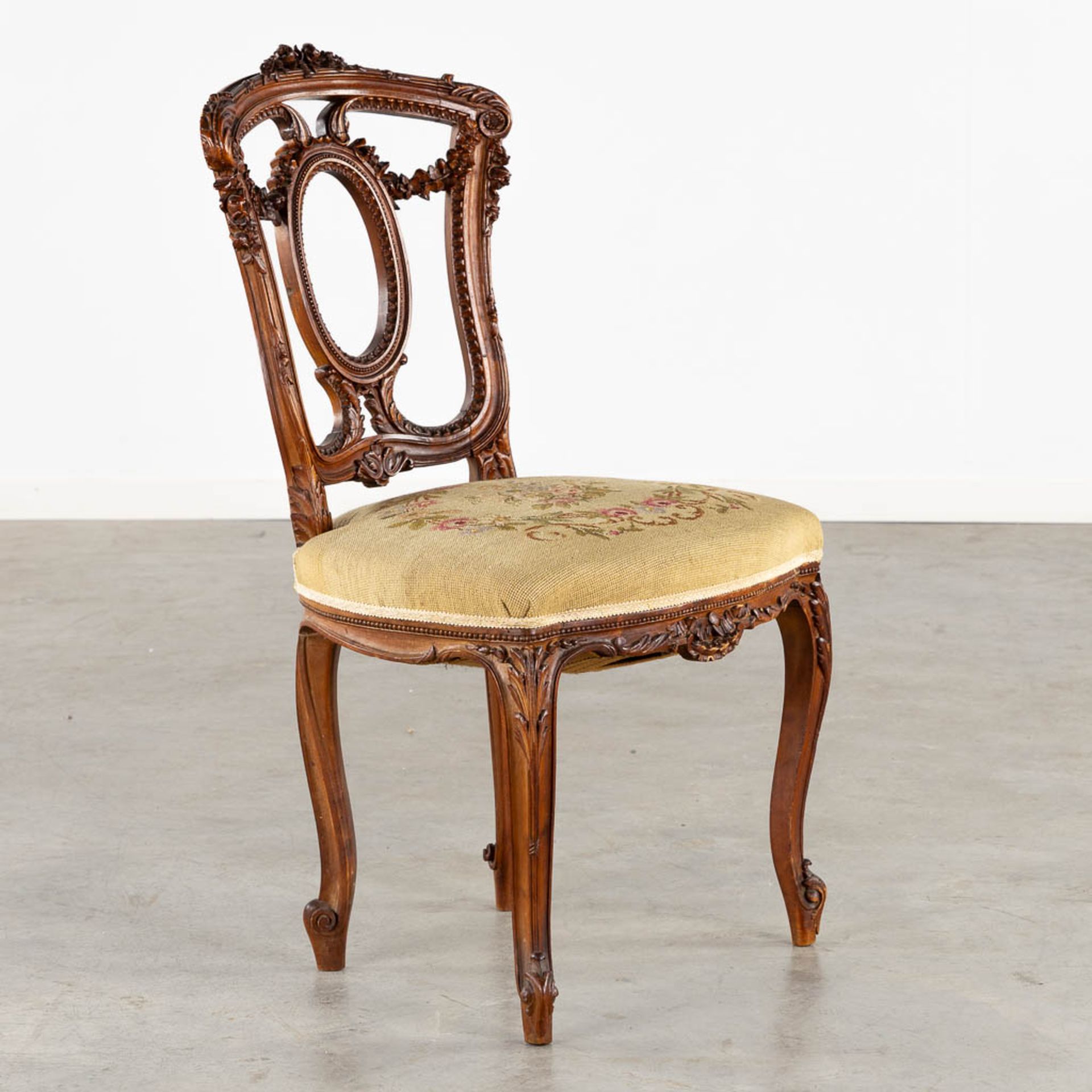 An exceptional set of 10 chairs, finely sculptured wood and embroideries in Louis XVI style. (L:51 x - Bild 12 aus 19