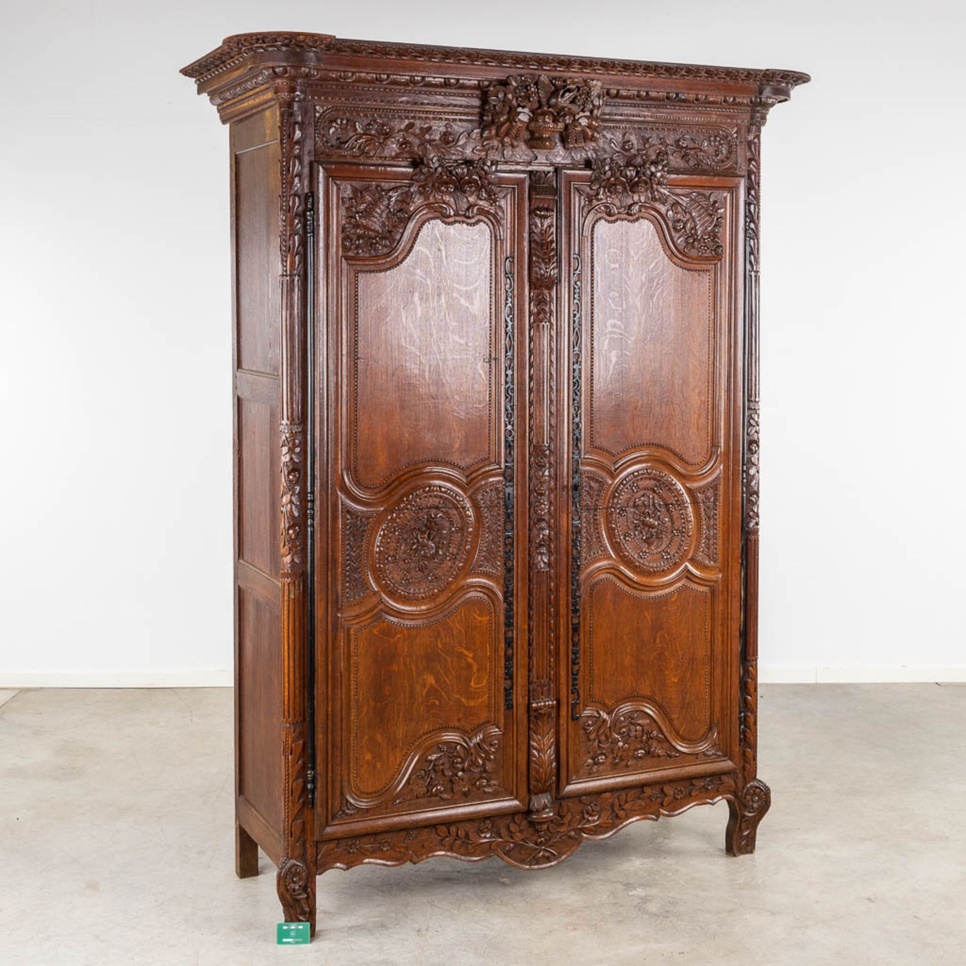 A richly sculptured and antique Normandy high cabinet, Armoire. France, 18th C. (L:68 x W:175 x H:23 - Bild 2 aus 21