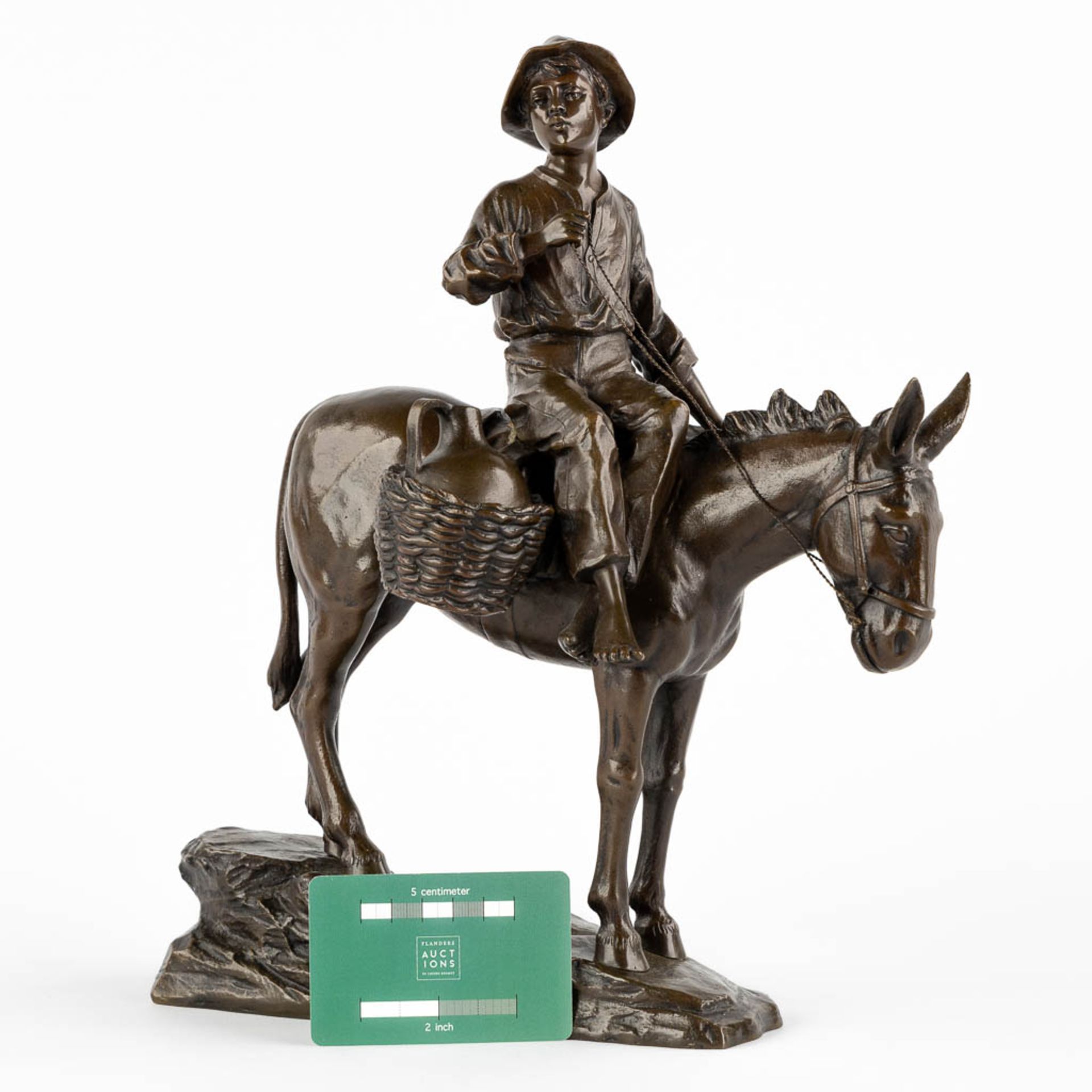 A small figurine of a young man riding a donkey, patinated bronze. Circa 1900. (L:18 x W:28 x H:33 c - Image 2 of 10