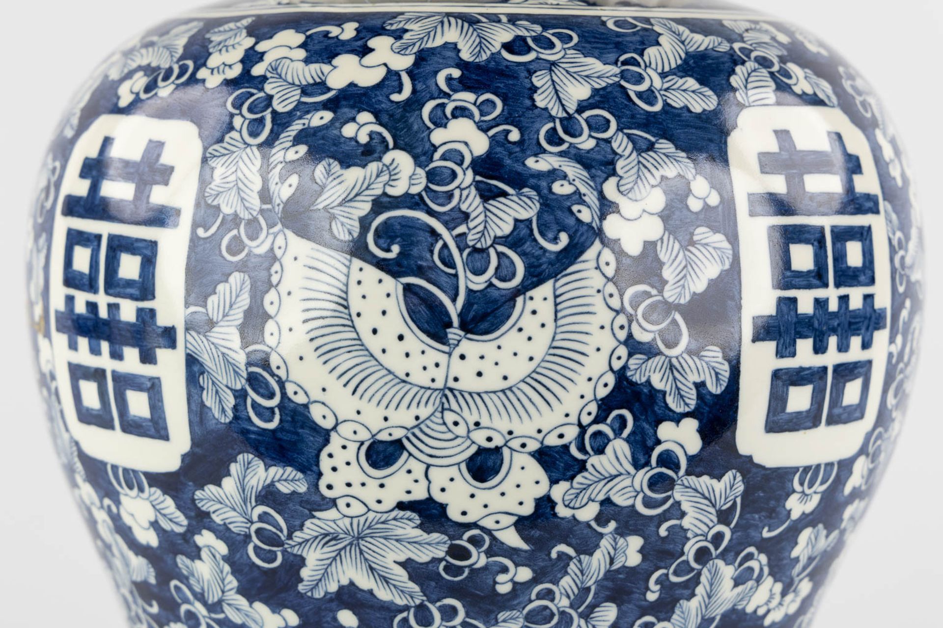 A Chinese baluster vase, blue-white with a Prunus decor and double XI sign. 19th/20th C. (H:42 x D:2 - Image 16 of 17