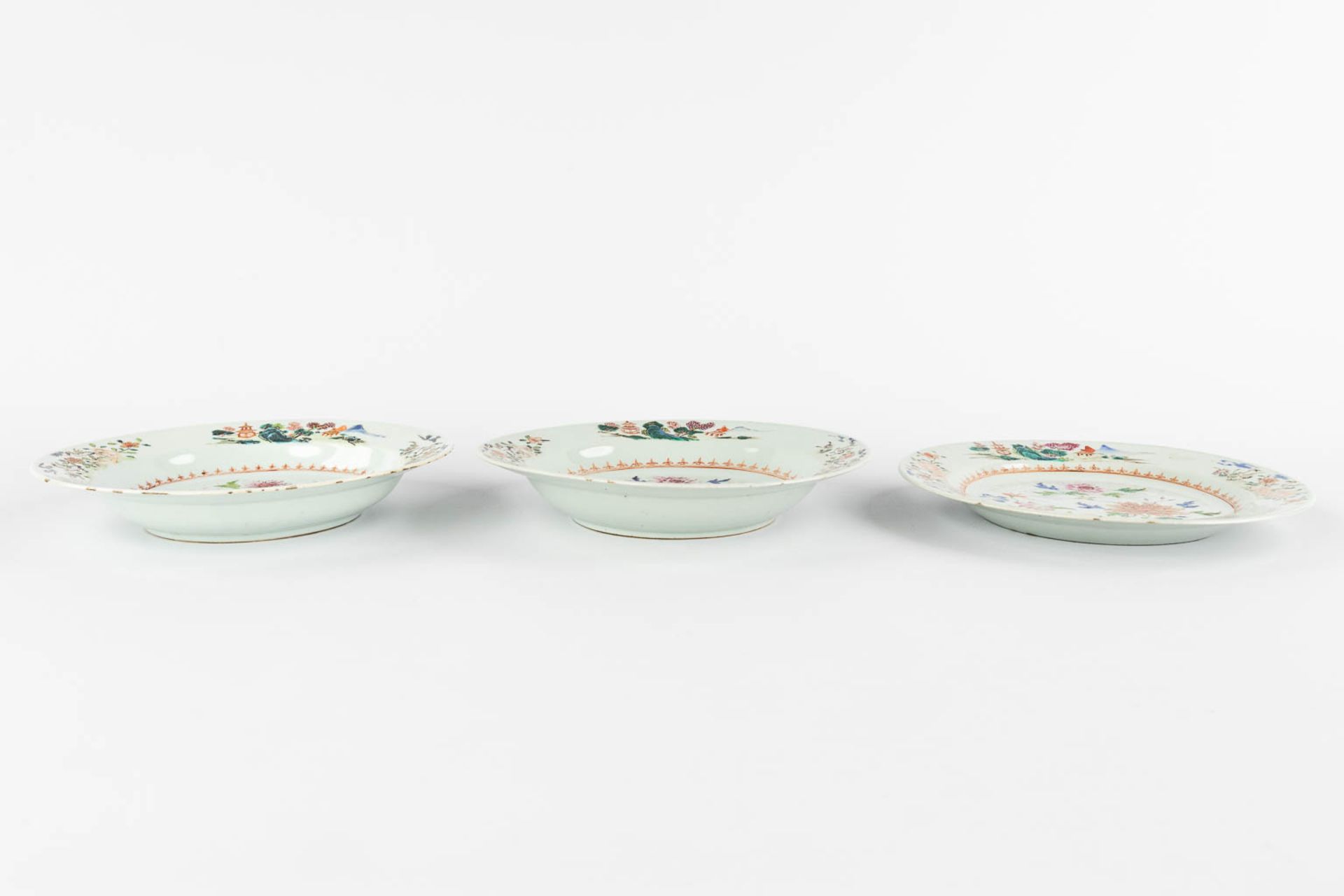 Three Chinese Famille Rose plates with a floral decor. 19th C. (D:22,5 cm) - Image 3 of 11