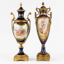 Svres, a cobalt blue vase mounted with bronze in Louis XVI style, 19th C. Added a Limoges vase. (L: