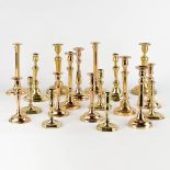 A large collection of 19 antique candlesticks and candle holders. Gilt and polished bronze. (H:25 x