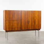 A mid-century bar cabinet, probably Hulmefa and signed 'Propos Meubelen'. Circa 1960. (L:45 x W:180
