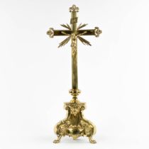 A large crucifix, brass, the second half of the 19th C. (L:22 x W:34 x H:83 cm)