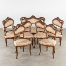 A 7-piece salon suite, sculptured wood in Louis XV style. Circa 1900. (L:64 x W:120 x H:100 cm)