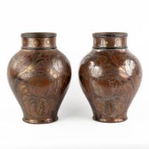 Boch Frres Keramis, a pair of Art Nouveau vases with a luster glaze. (H:33 x D:24 cm)