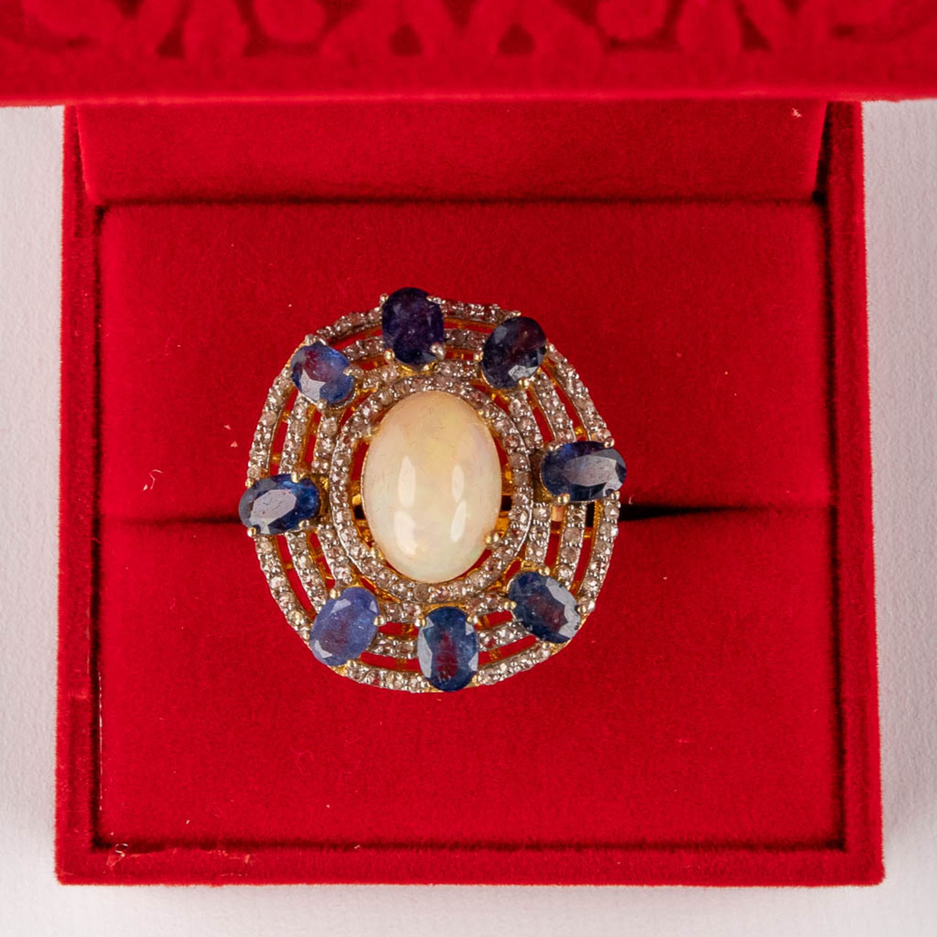 A ring, gilt silver with an Opal, sapphires, opal and 'old cut' diamonds. Ring size: 57. 10,26g. - Image 4 of 11