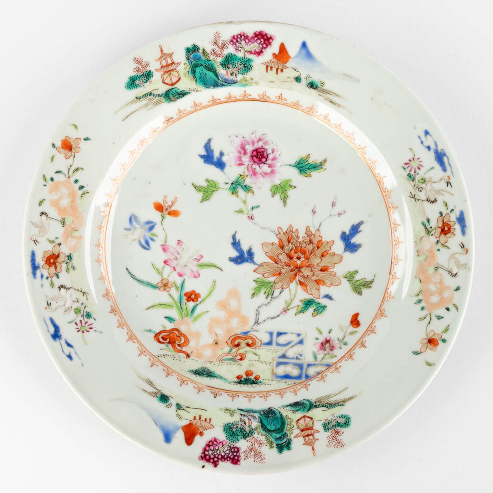 Three Chinese Famille Rose plates with a floral decor. 19th C. (D:22,5 cm) - Image 8 of 11