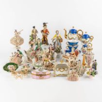 A large collection of polychrome porcelain, Limoges tte ˆ tte, Figurines Capodimonte and Dresden.