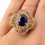 A ring, gilt silver with a natural probably sapphire and 'old cut' diamonds. Ring size: 58, 8,17g.