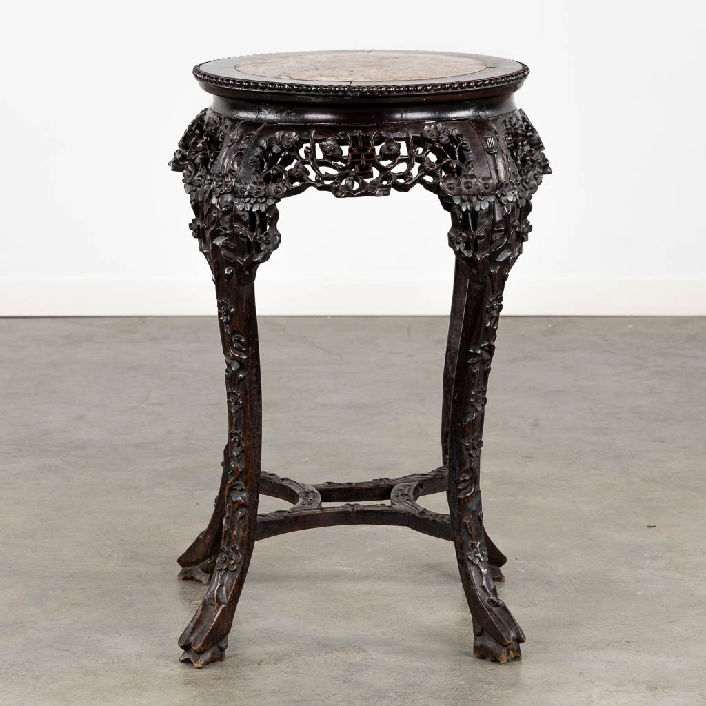 A richly sculptured Chinese hardwood side table or pedestal with a marble. (H:71 x D:53 cm) - Image 4 of 12