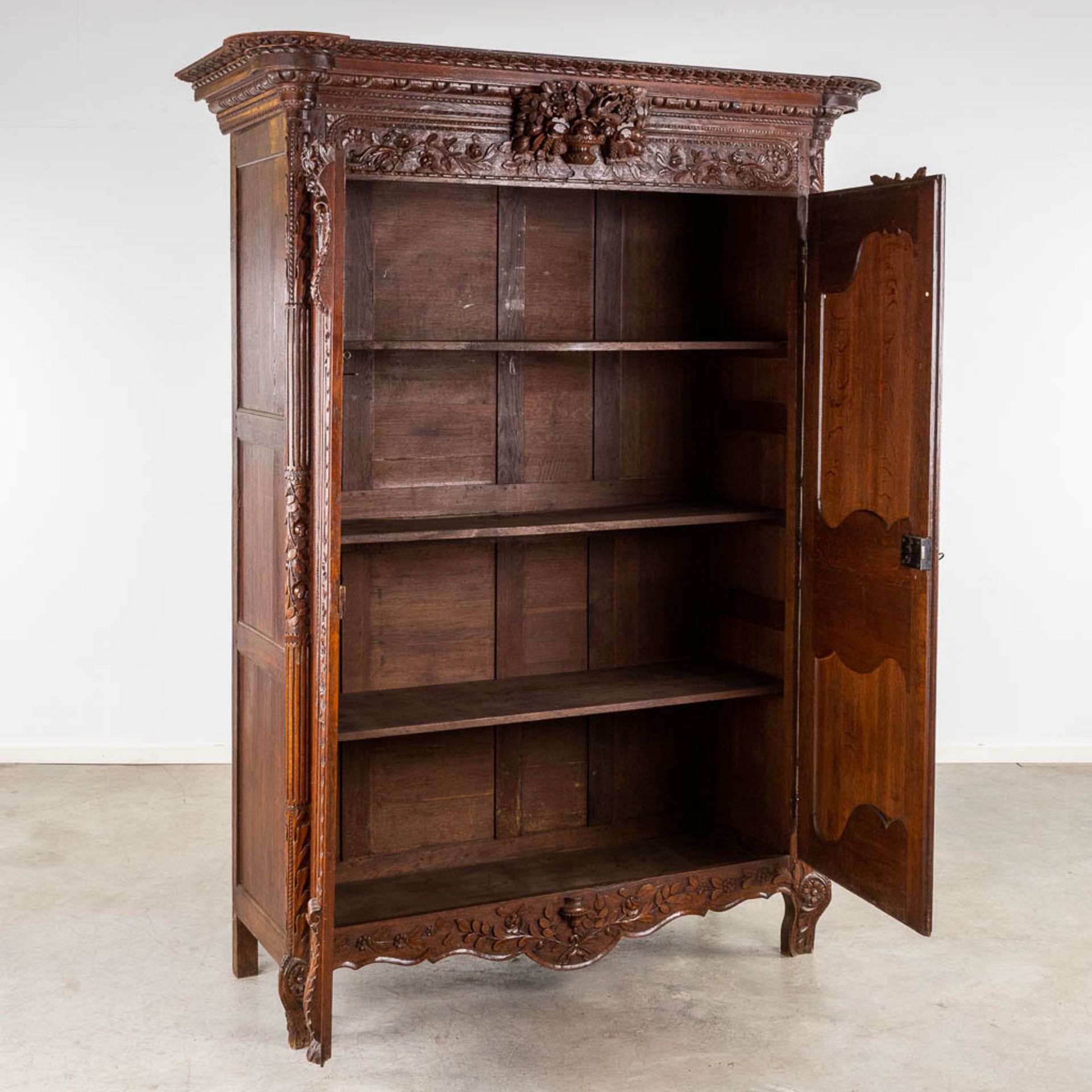 A richly sculptured and antique Normandy high cabinet, Armoire. France, 18th C. (L:68 x W:175 x H:23 - Bild 3 aus 21