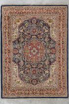 An Oriental hand-made carpet. (L:248 x W:177 cm)