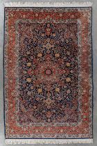 An Oriental hand-made carpet, Tabriz. (L:299 x W:202 cm)