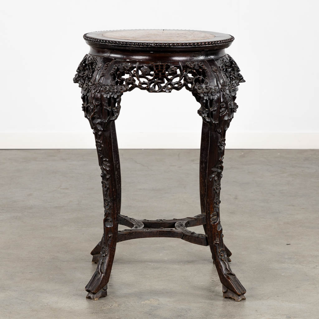 A richly sculptured Chinese hardwood side table or pedestal with a marble. (H:71 x D:53 cm) - Image 6 of 12