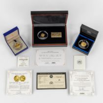 A set of 3 gold coins in decorative storage boxes, 18,67g, 24 ct gold. (L:10 x W:15 x H:3,5 cm)