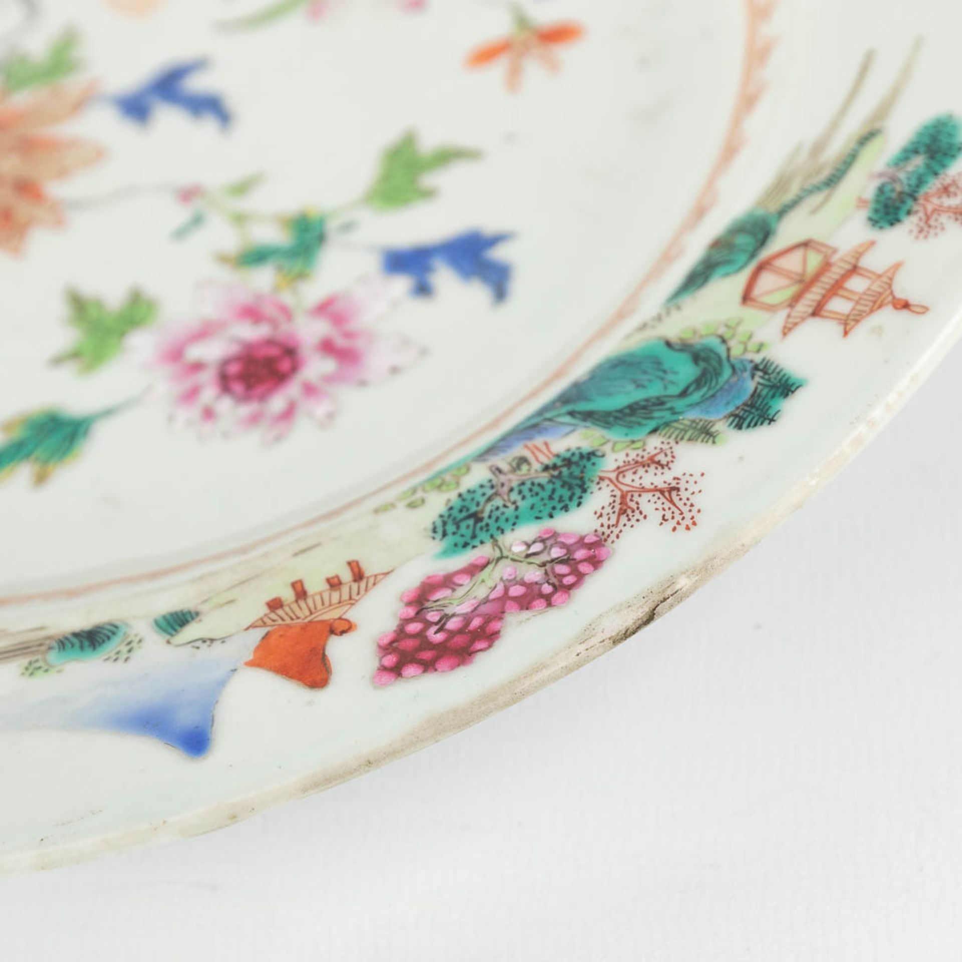 Three Chinese Famille Rose plates with a floral decor. 19th C. (D:22,5 cm) - Image 9 of 11