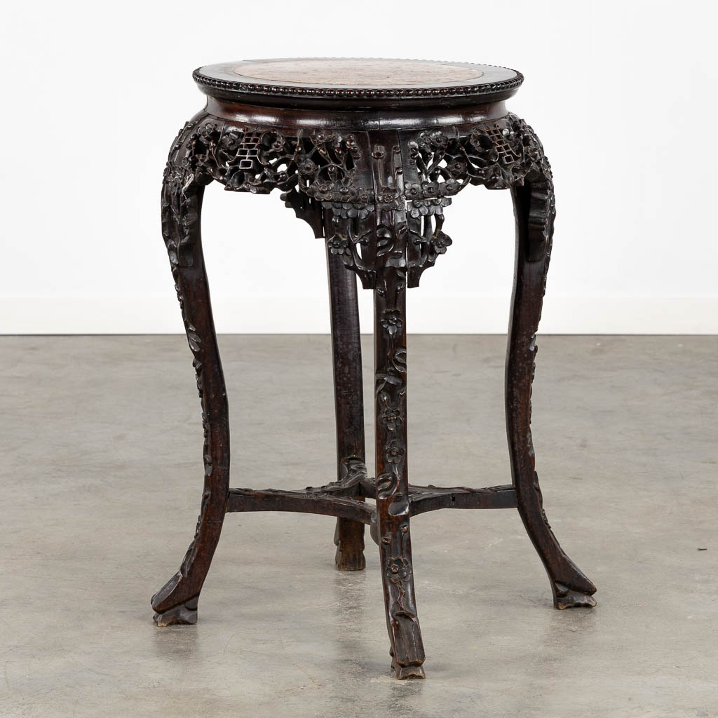 A richly sculptured Chinese hardwood side table or pedestal with a marble. (H:71 x D:53 cm) - Image 3 of 12