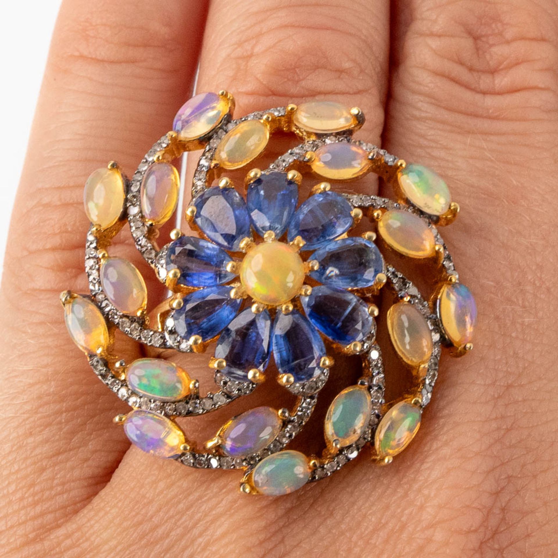 A ring, gilt zilver with opal, old cut diamonds and 'Kyanite'. Ring size 56, 12,3g.