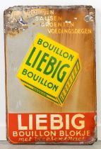 An antique enamel plate 'Bouillon Liebig' Bouillon blokje met vleesextract. 1951. (W:39 x H:58 cm)