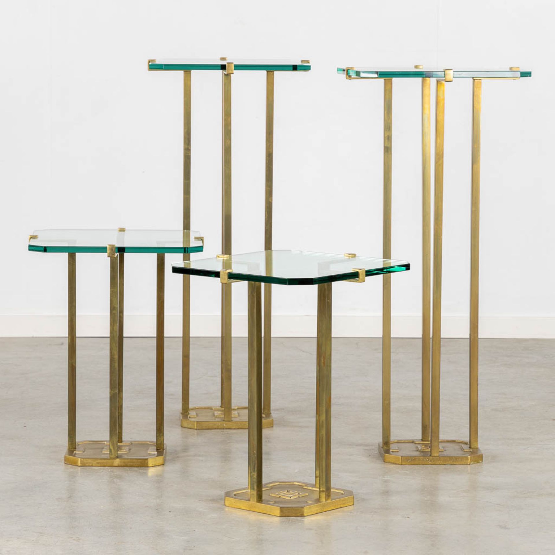 Peter GHYCZY (1940) 'Four Side Tables' bronze and glass. (L:41 x W:41 x H:93 cm)