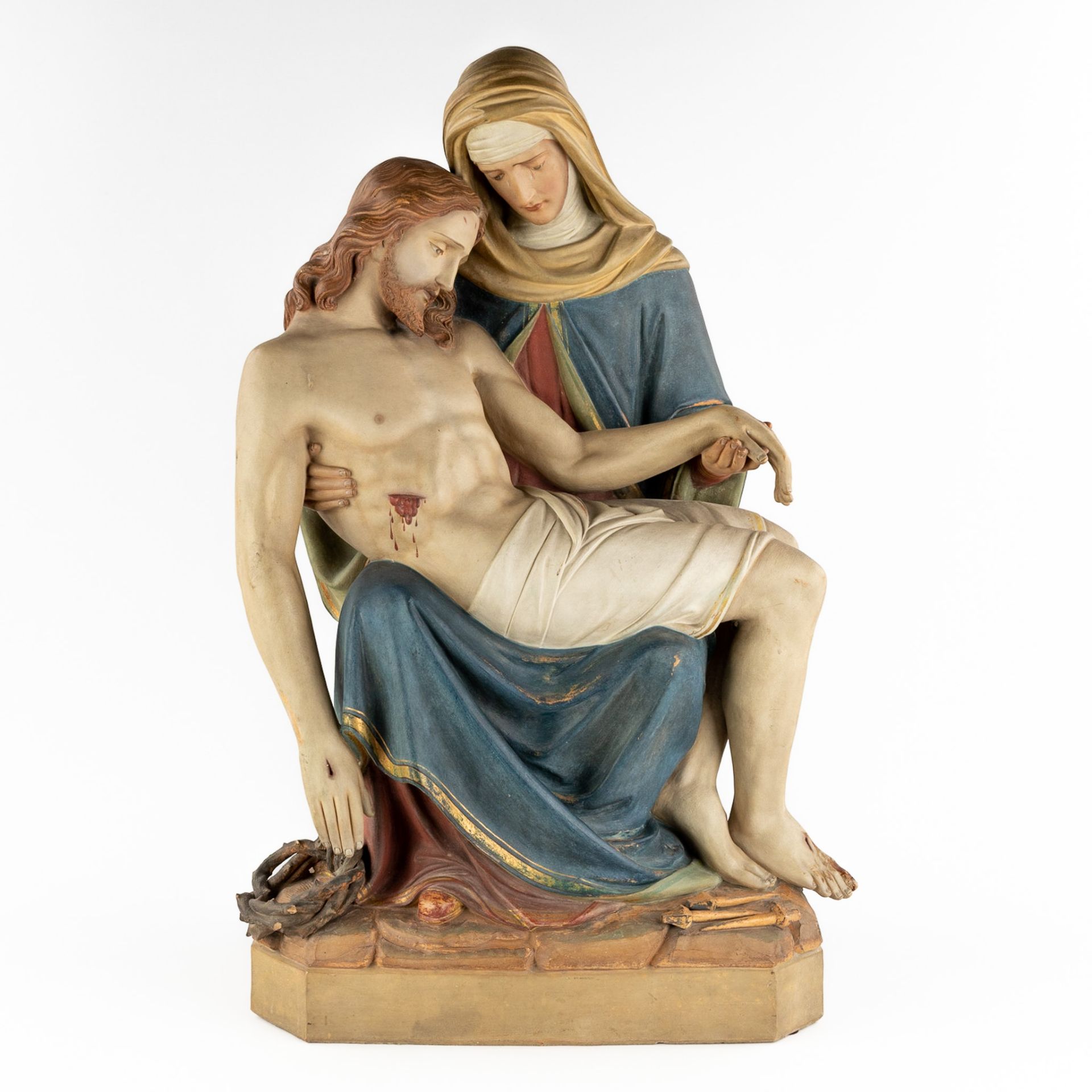 A Piétà, polychrome terracotta. 19th century. (L:47 x W:28 x H:72 cm)