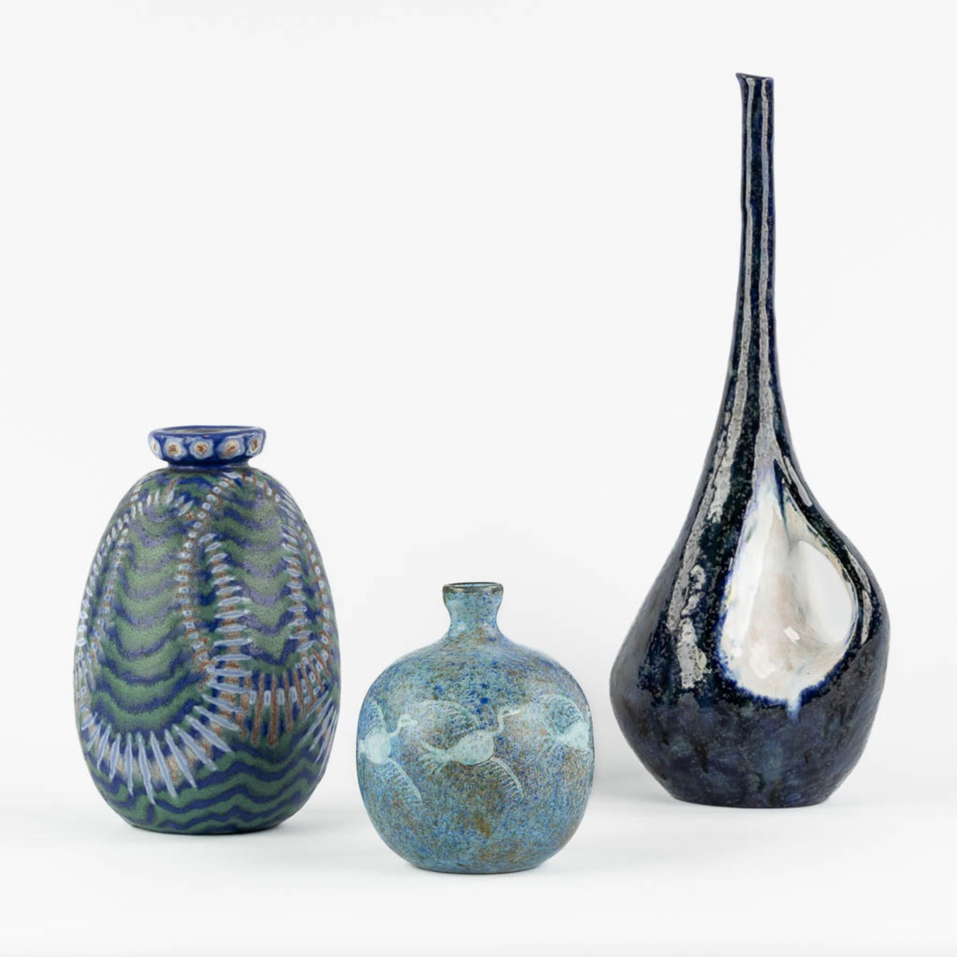 Three ceramic vases with a blue glaze. Revernay, Bertocci en Vallauris. Circa 1960. (L:13 x W:16 x H