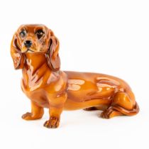 A ceramic figurine of a Dachshund or Tackle dog, Italy. (L:20 x W:55 x H:35 cm)