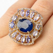 A ring, gilt silver with a central sapphire, 'Tanzanite' and 'old cut' diamonds. 9,26g. Ring size 56