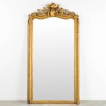 A large mirror, wood and gilt stucco, decorated with Flora. (W:105 x H:200 cm)