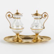 A pair of water and wine cruets, gothic revival, gold-plated metal. 20th C. (L:14 x W:25 x H:17,5 cm