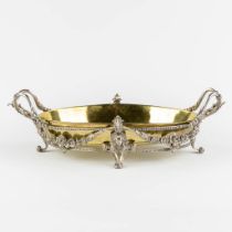 A silver and brass Jardinière, richly decorated with figurines and garlands. 800/1000. 1070g. (L:27