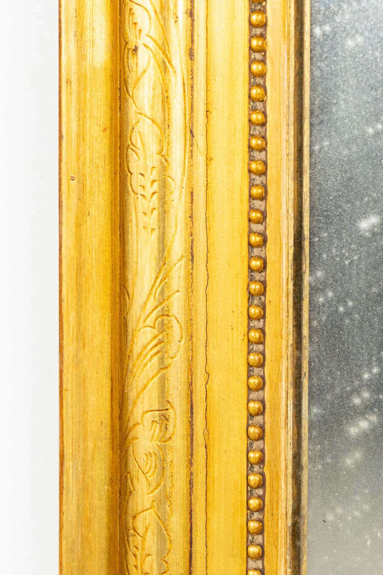 An antique mirror, gilt wood and stucco. Circa 1900. (W:82 x H:122 cm) - Image 9 of 11
