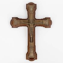 A Bronze Neoroman crucifix mounted on a wood base, signed Spoorenberg, fecit. (W:33 x H:46 cm)