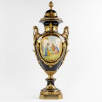 Sèvres, a large cobalt-blue and bronze mounted vase with hand-painted decors. (L:33 x W:38 x H:98 cm