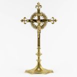 An antique crucifix with corpus christi, bronze, decorated with enamel and a cabochon. 19th C. (L:14