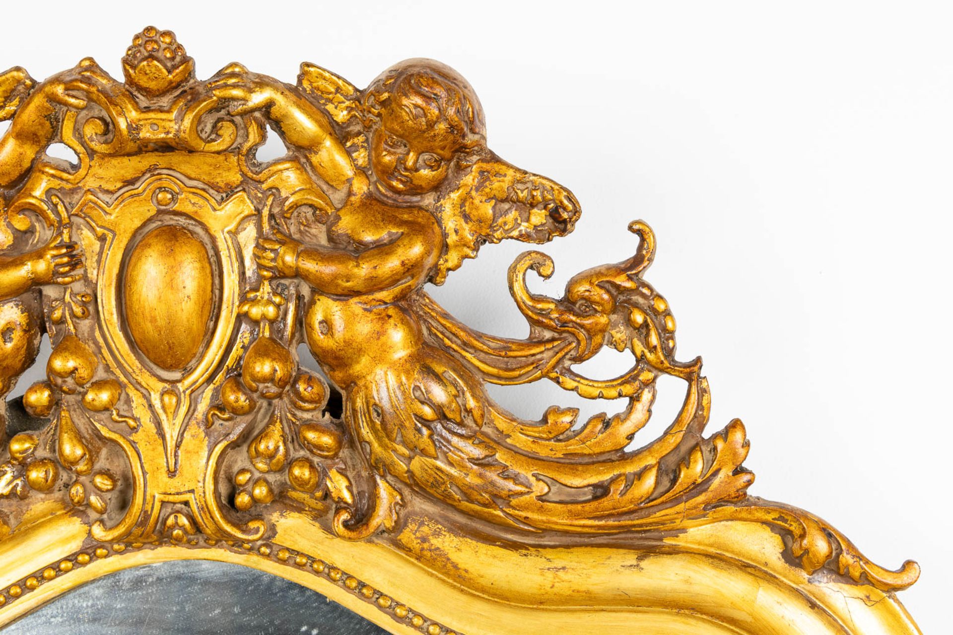 An antique mirror, gilt wood and stucco. Circa 1900. (W:82 x H:122 cm) - Image 5 of 11