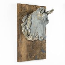 An antique zinc Horse Head, mounted on a wood board. Circa 1920. (L:40 x W:39 x H:44 cm)