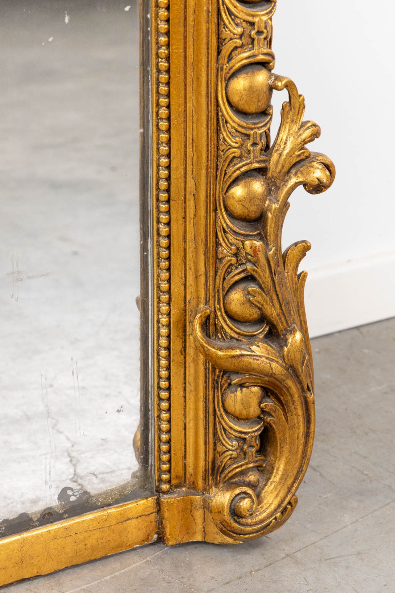 A mirror, sculptured wood, and stucco in a Louis XV style. 20th C. (W:110 x H:218 cm) - Image 3 of 13