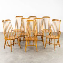 Two armchairs and six chairs, in the style of Ercol, probably Northern-Europe. (L:54 x W:68 x H:102