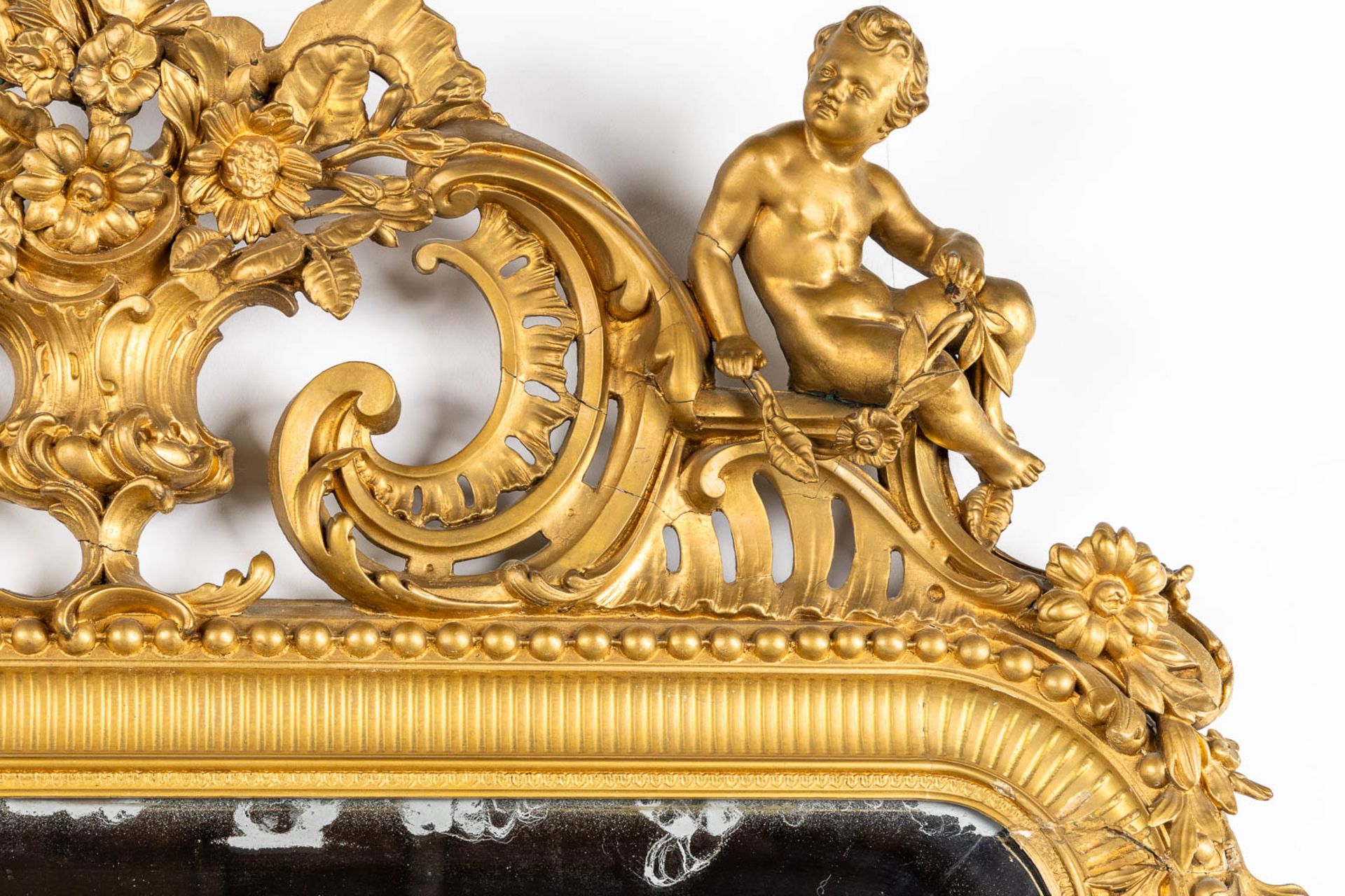 An antique and large mirror, decorated with putti in Louis XV style. Circa 1900. (W:130 x H:225 cm) - Image 5 of 11