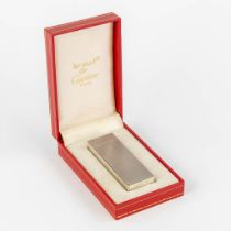 Must De Cartier, a vintage lighter in the original box. (L:1,2 x W:2,5 x H:7 cm)