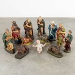 A 12-piece 'Nativity Scène', polychrome plaster. (H:45 cm)